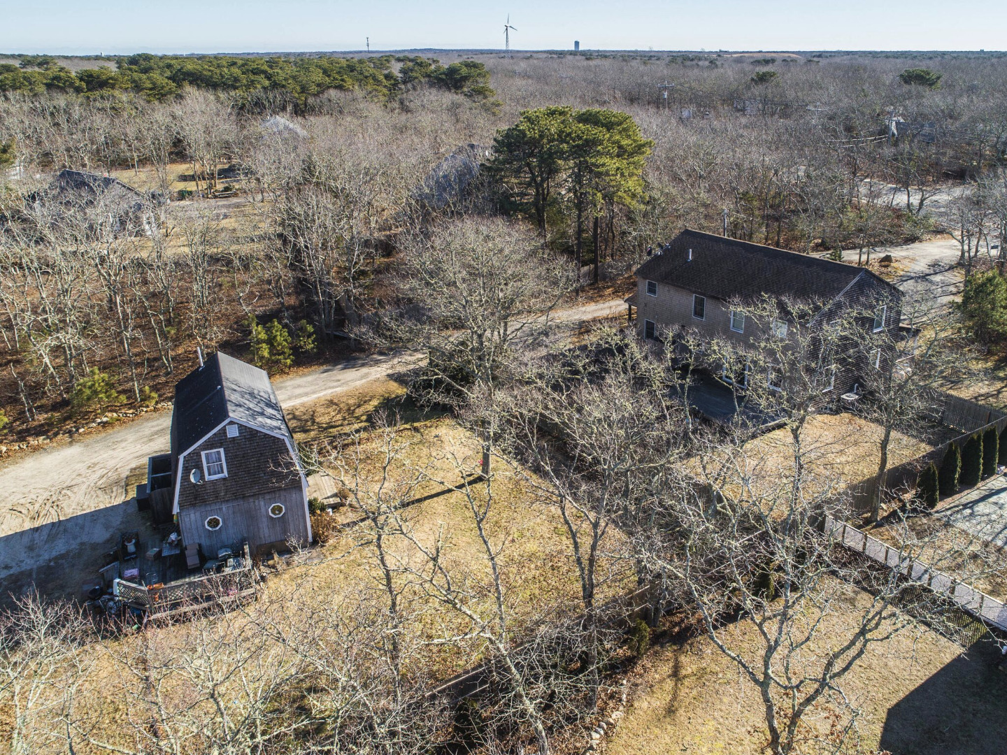 375 West Tisbury Road Edgartown, MA 02539 - Photo 9 of 32 an aerial view of a house with a yard