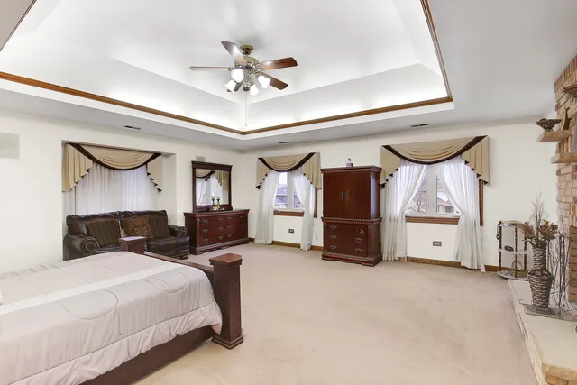 a bedroom with bed and window