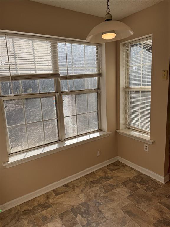 250 Countryside Lane Covington, GA 30016 - Photo 5 of 19 a view of an empty room with a window
