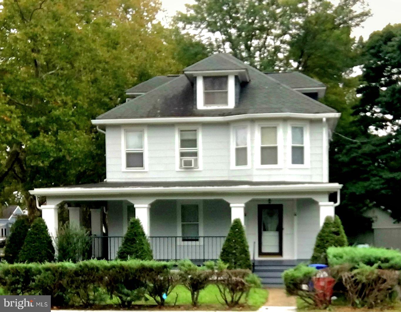 2635 Nottingham Way, Unit 1 Hamilton, NJ 08619 - Photo 1 of 10 Charming two-story home with lush greenery.