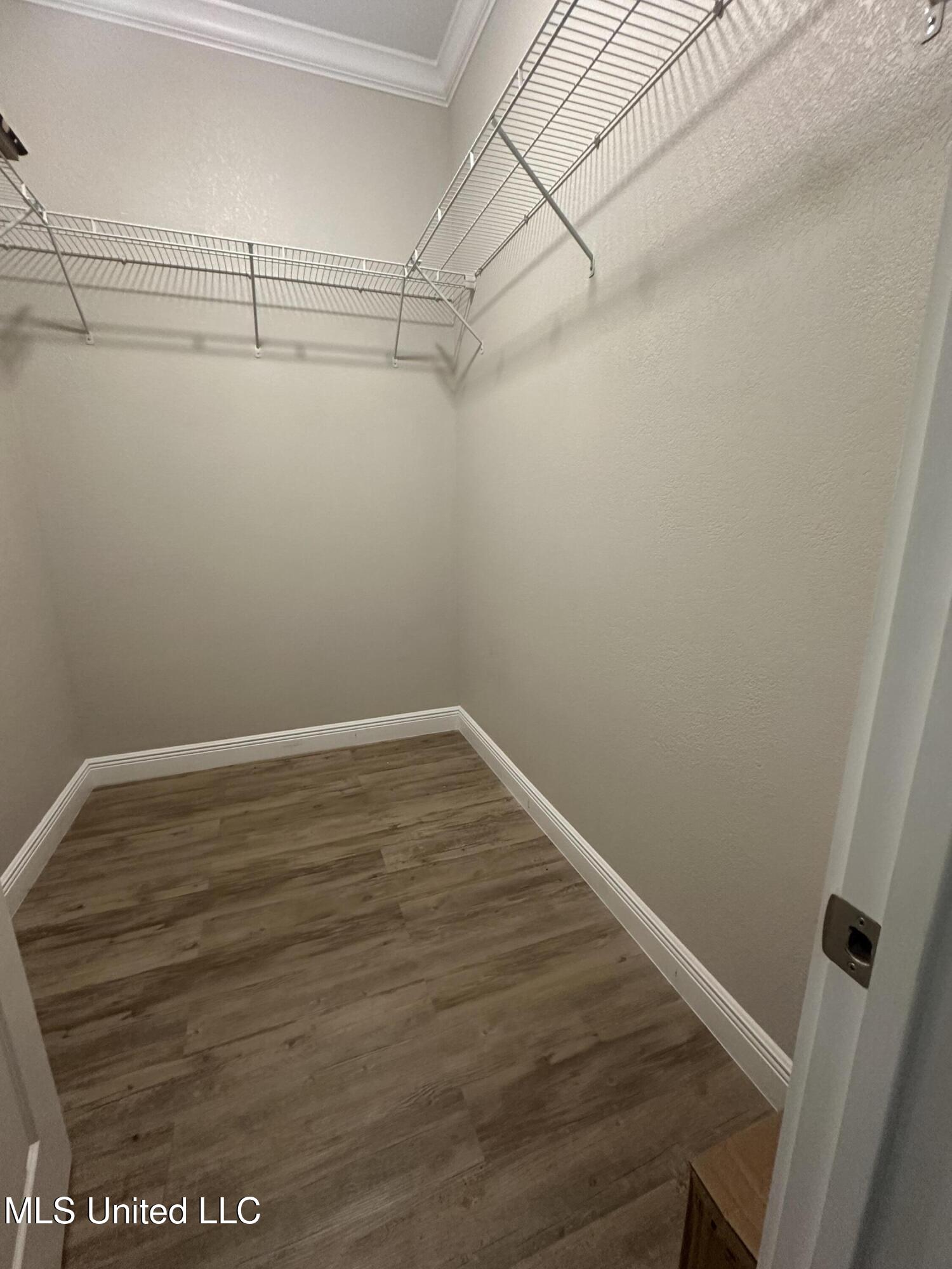 1822 15th Street, Unit A Gulfport, MS 39501 - Photo 11 of 17 Primary Bedroom Closet