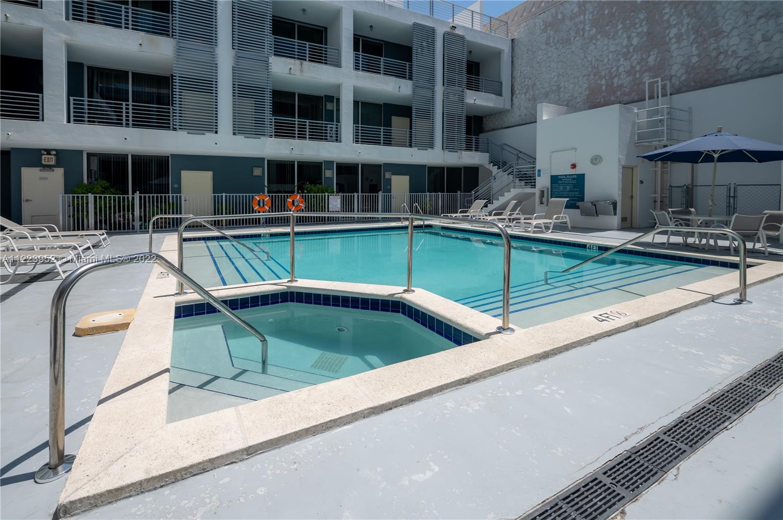 3339 Virginia Street, Unit 339 Miami, FL 33133 - Photo 11 of 13 a view of a house with pool table and chairs
