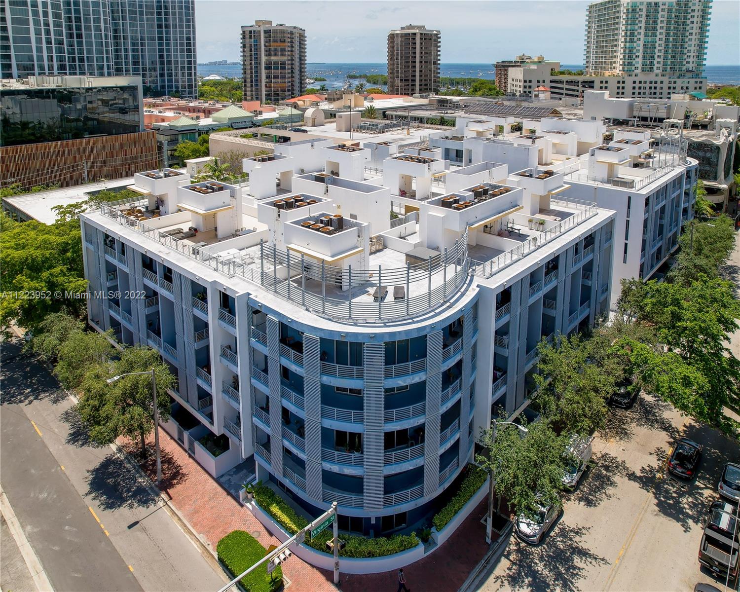 3339 Virginia Street, Unit 339 Miami, FL 33133 - Photo 13 of 13 a large building with a city view