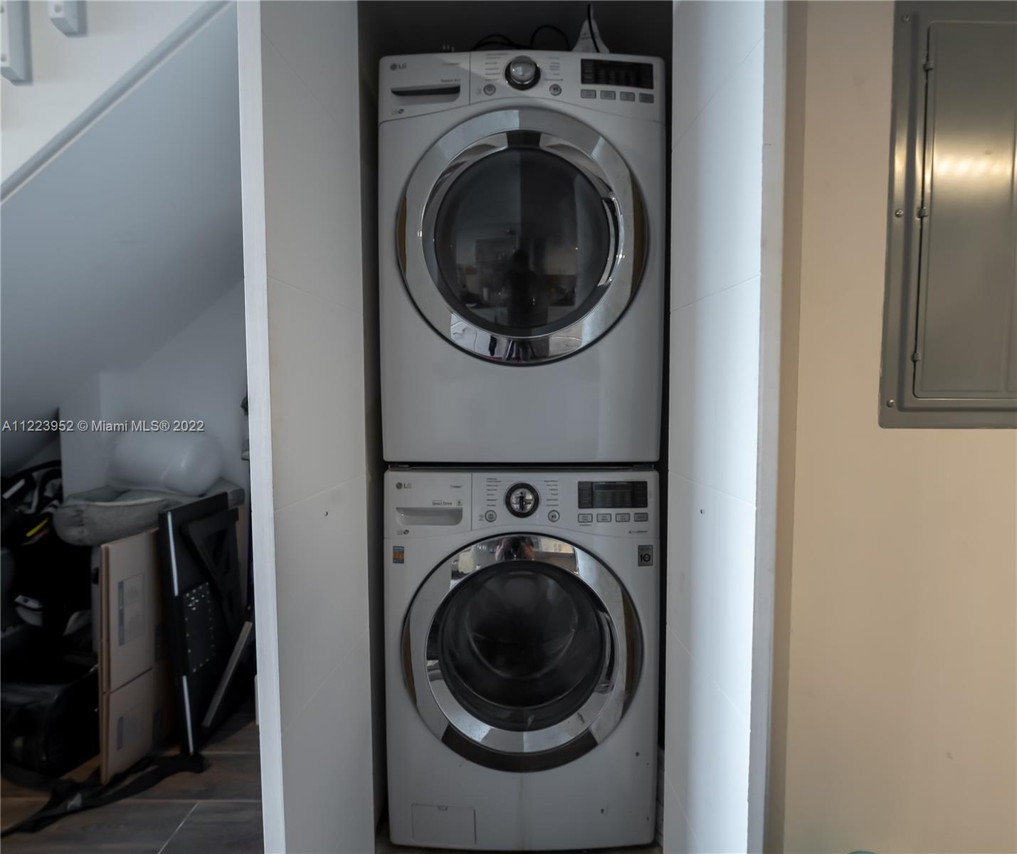 3339 Virginia Street, Unit 339 Miami, FL 33133 - Photo 5 of 13 a utility room with dryer and washer