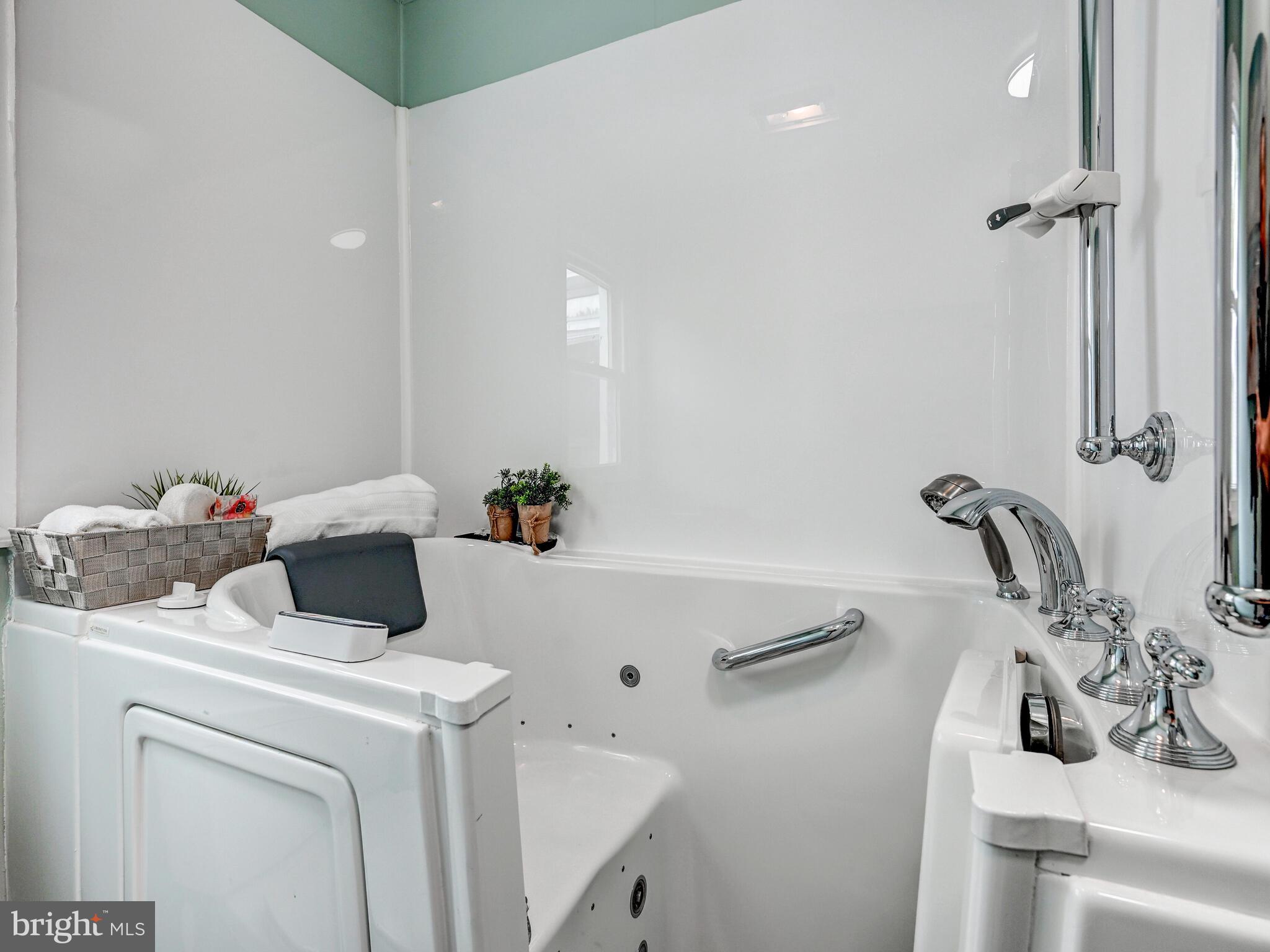 2411 Ruth Avenue Sparrows Point, MD 21219 - Photo 26 of 43 a bathroom with a sink and a mirror