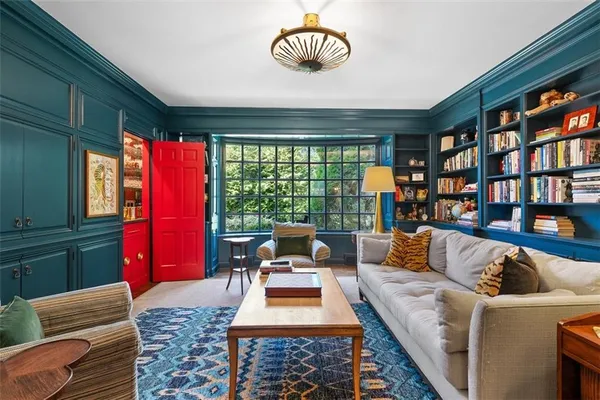 a large kitchen with a table and chairs