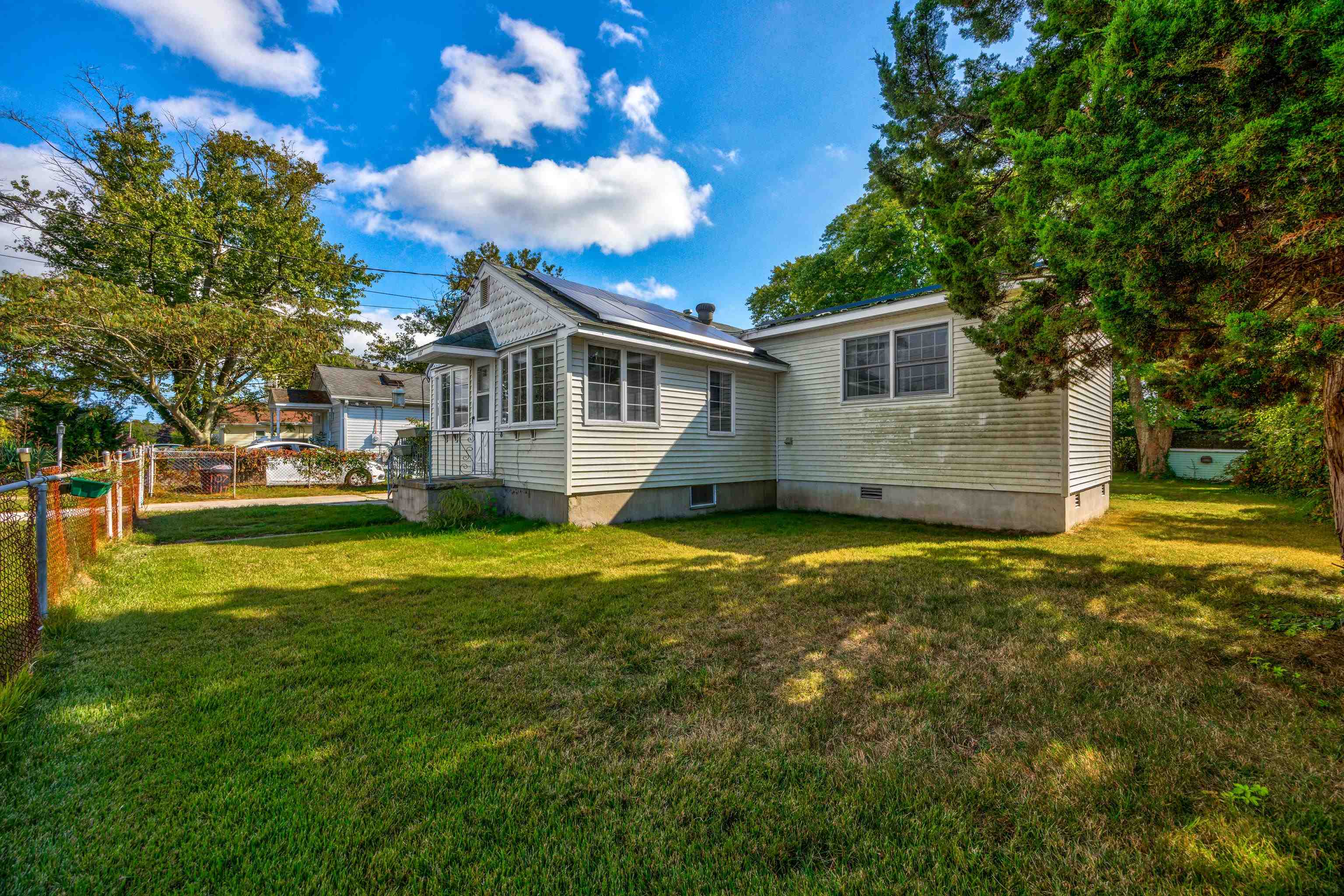 107 Rutledge Avenue Del Haven, NJ 08251 - Photo 3 of 24 a view of a house with a backyard