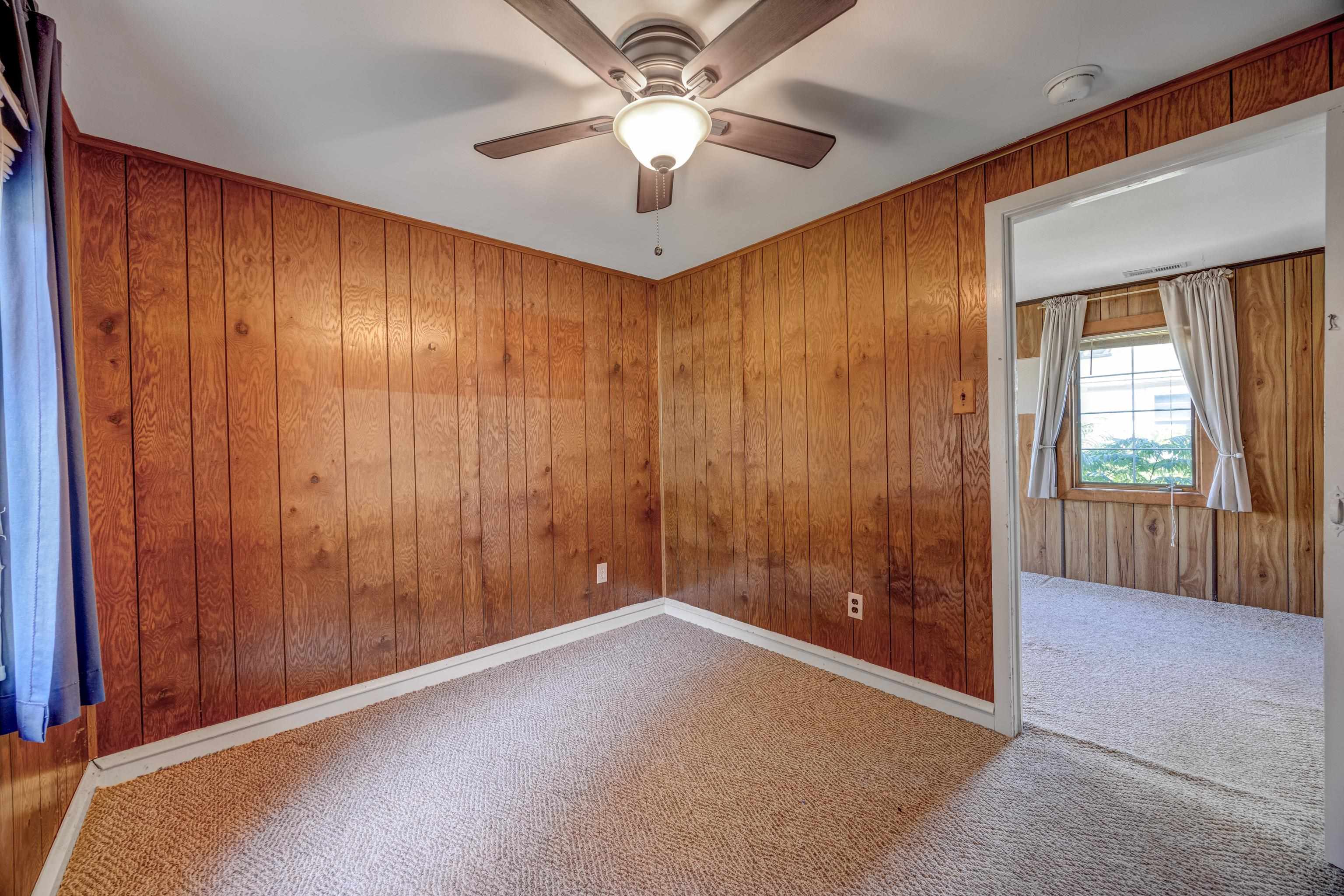 107 Rutledge Avenue Del Haven, NJ 08251 - Photo 8 of 24 an empty room with closet and chandelier fan