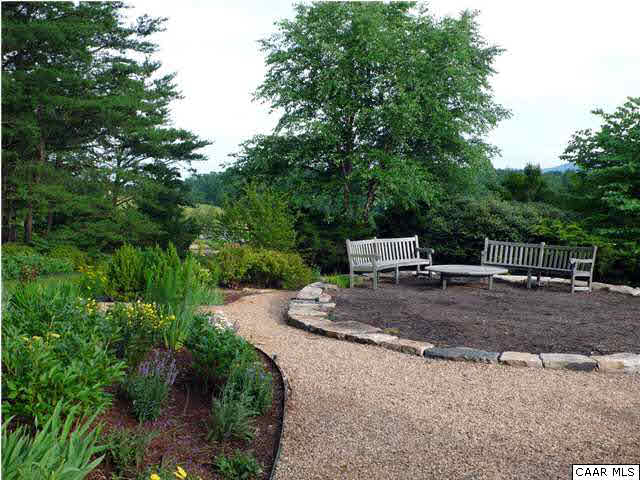 86 Rainbow Ridge Road Faber, VA 22938 - Photo 29 of 30 a view of a backyard with trees