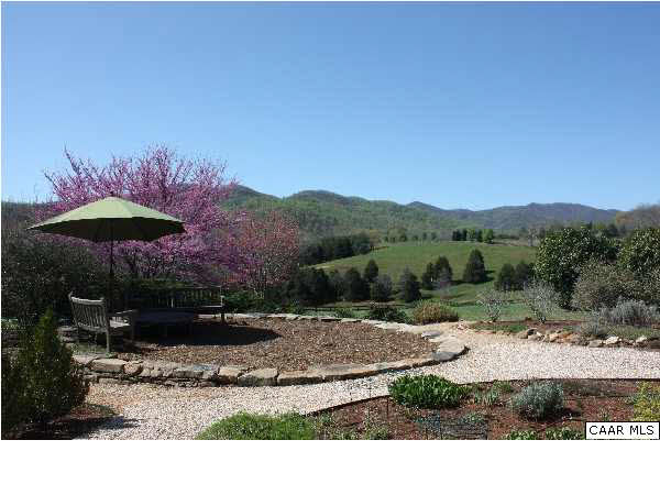 86 Rainbow Ridge Road Faber, VA 22938 - Photo 30 of 30 a view of a terrace with a garden