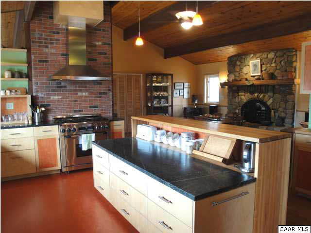86 Rainbow Ridge Road Faber, VA 22938 - Photo 9 of 30 a kitchen with stainless steel appliances granite countertop a sink a stove counter space and cabinets