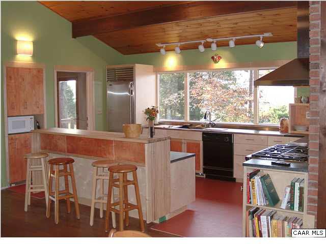 86 Rainbow Ridge Road Faber, VA 22938 - Photo 10 of 30 a kitchen with stainless steel appliances granite countertop a sink a stove and a refrigerator