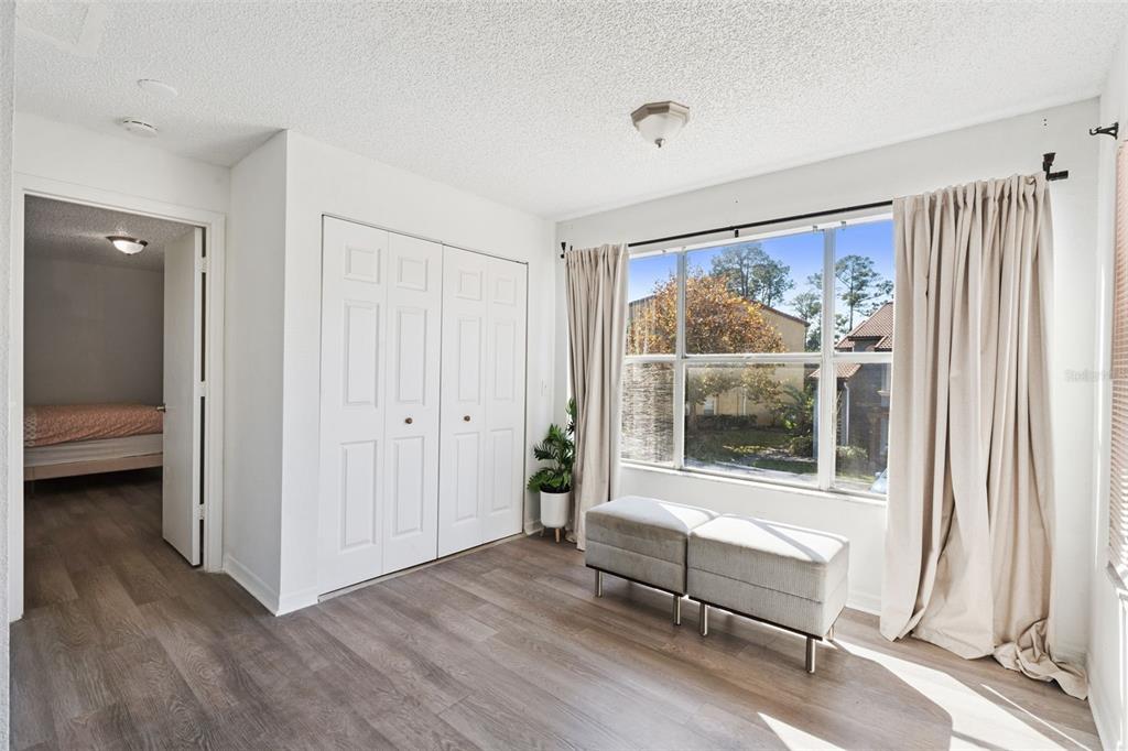 5120 Conroy Road, Unit 28 Orlando, FL 32811 - Photo 11 of 39 a view of a room with wooden floor and a window