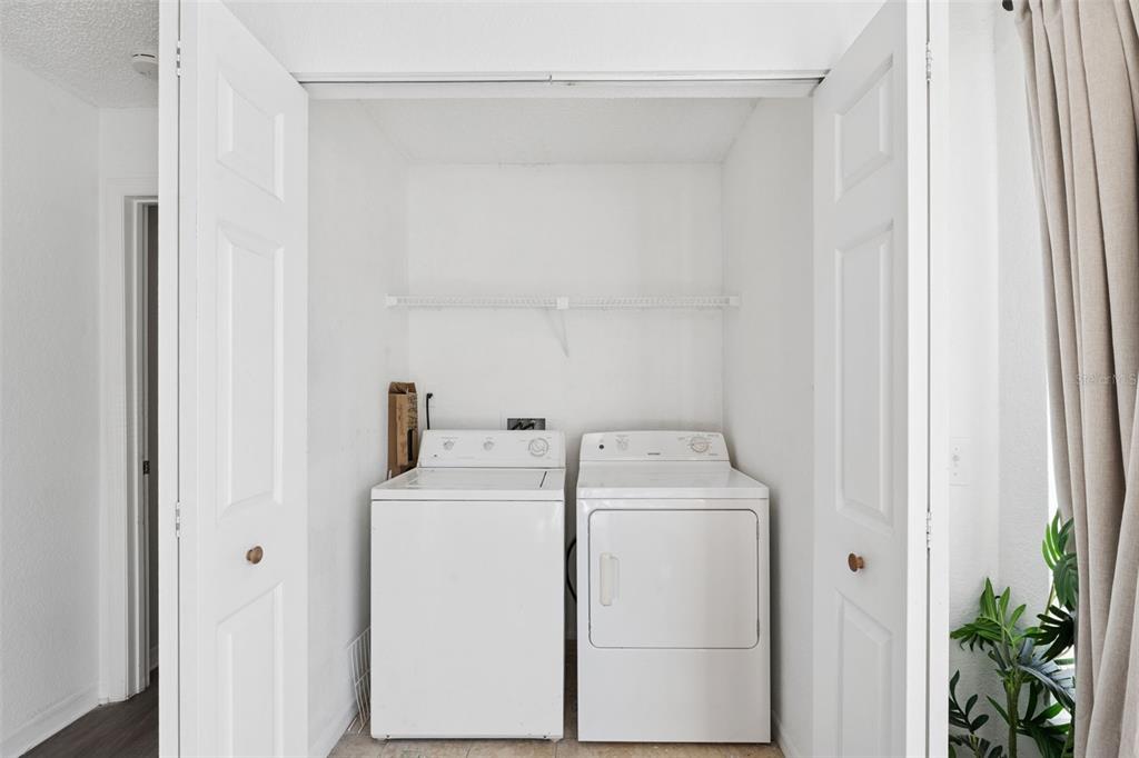 5120 Conroy Road, Unit 28 Orlando, FL 32811 - Photo 19 of 39 a utility room with dryer and washer