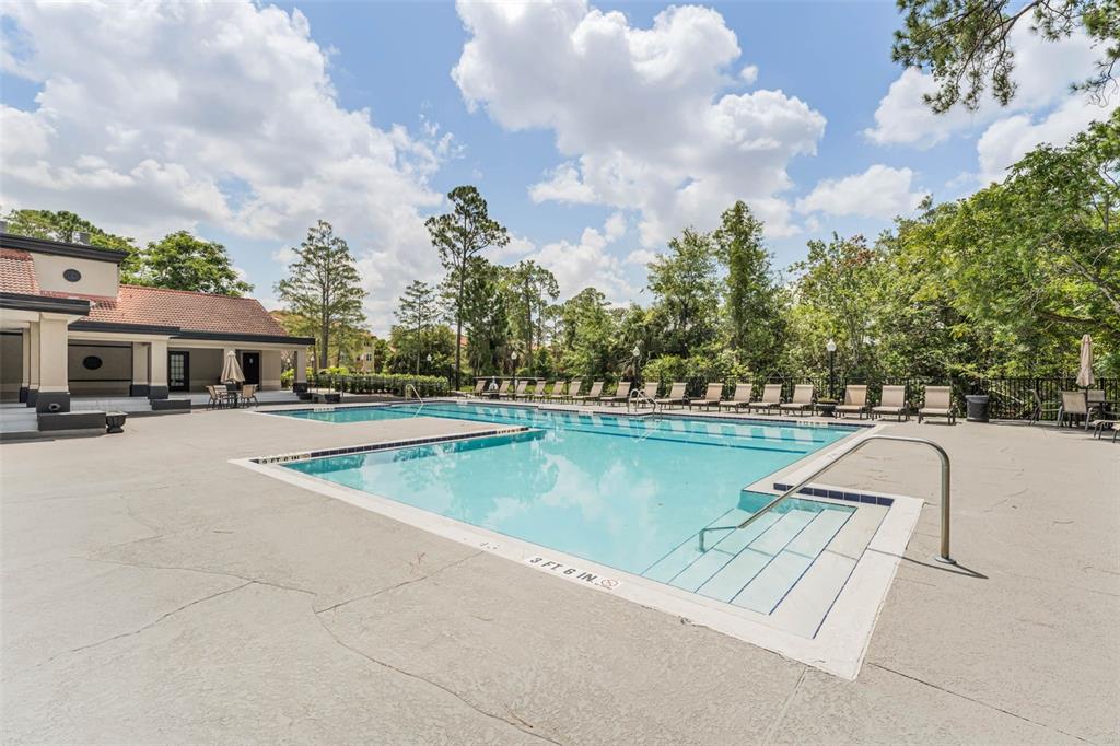 5120 Conroy Road, Unit 28 Orlando, FL 32811 - Photo 28 of 39 a view of swimming pool from a lake view