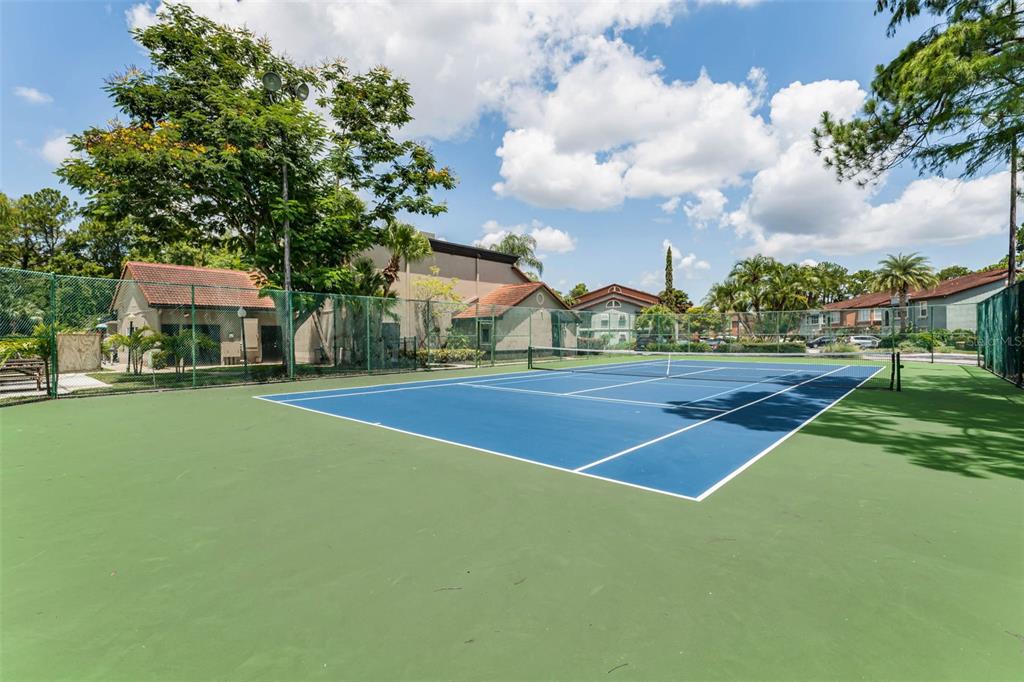 5120 Conroy Road, Unit 28 Orlando, FL 32811 - Photo 37 of 39 a view of outdoor space and tennis court