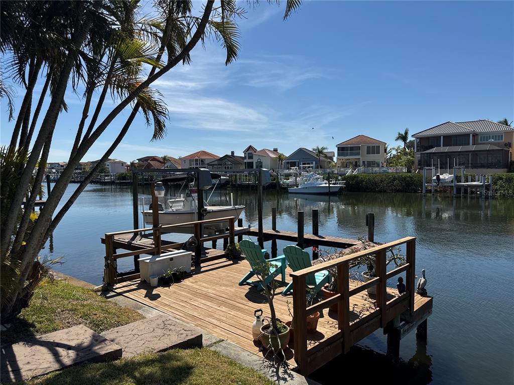 6319 Cocoa Lane Apollo Beach, FL 33572 - Photo 24 of 37 a view of a roof deck with table and chairs
