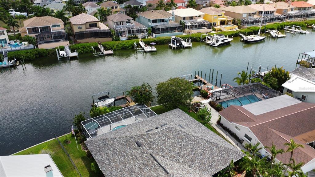 6319 Cocoa Lane Apollo Beach, FL 33572 - Photo 26 of 37 an aerial view of a house with outdoor space and lake view