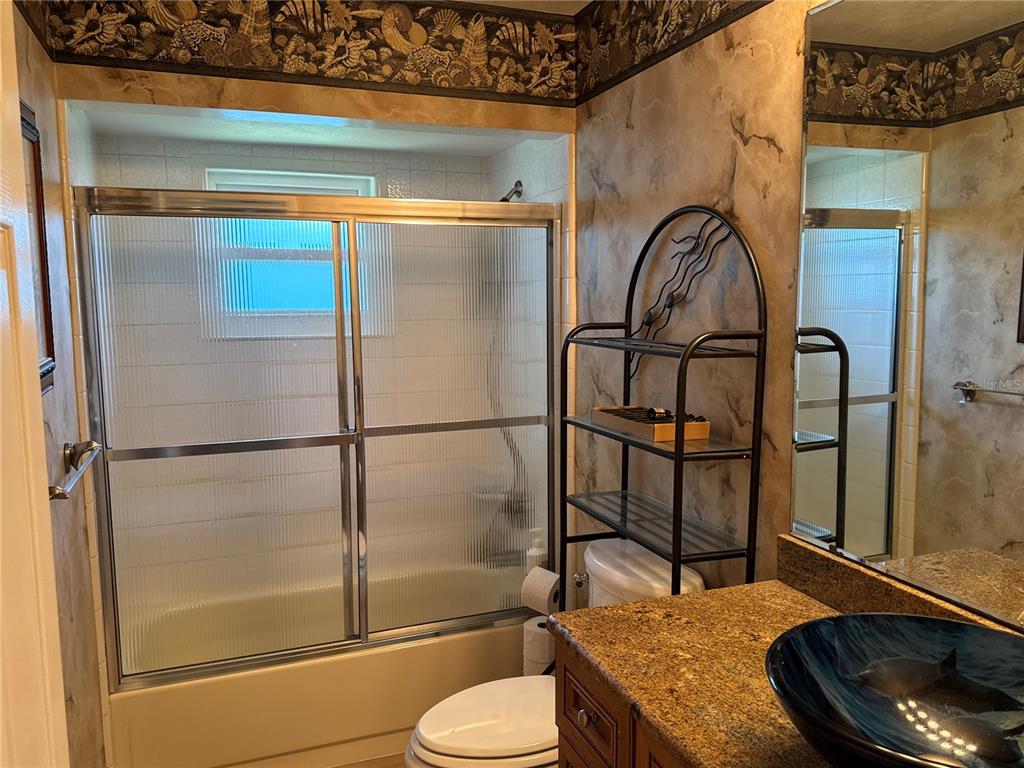 6319 Cocoa Lane Apollo Beach, FL 33572 - Photo 30 of 37 a bathroom with a sink toilet and shower