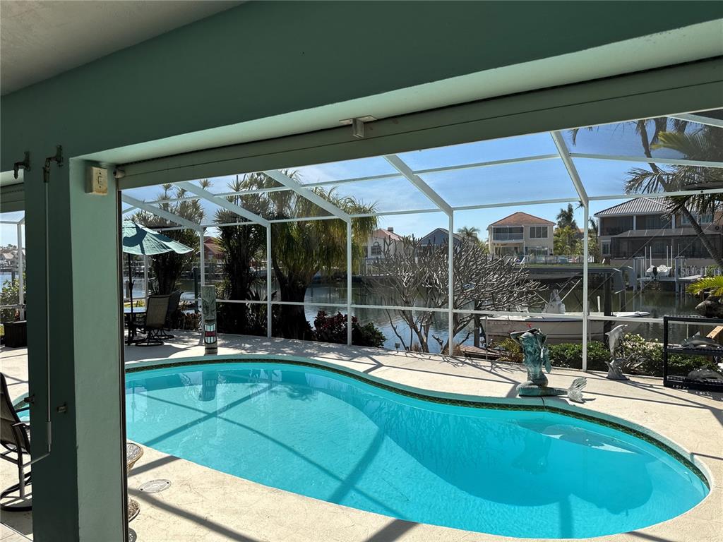 6319 Cocoa Lane Apollo Beach, FL 33572 - Photo 35 of 37 a swimming pool with outdoor seating and yard