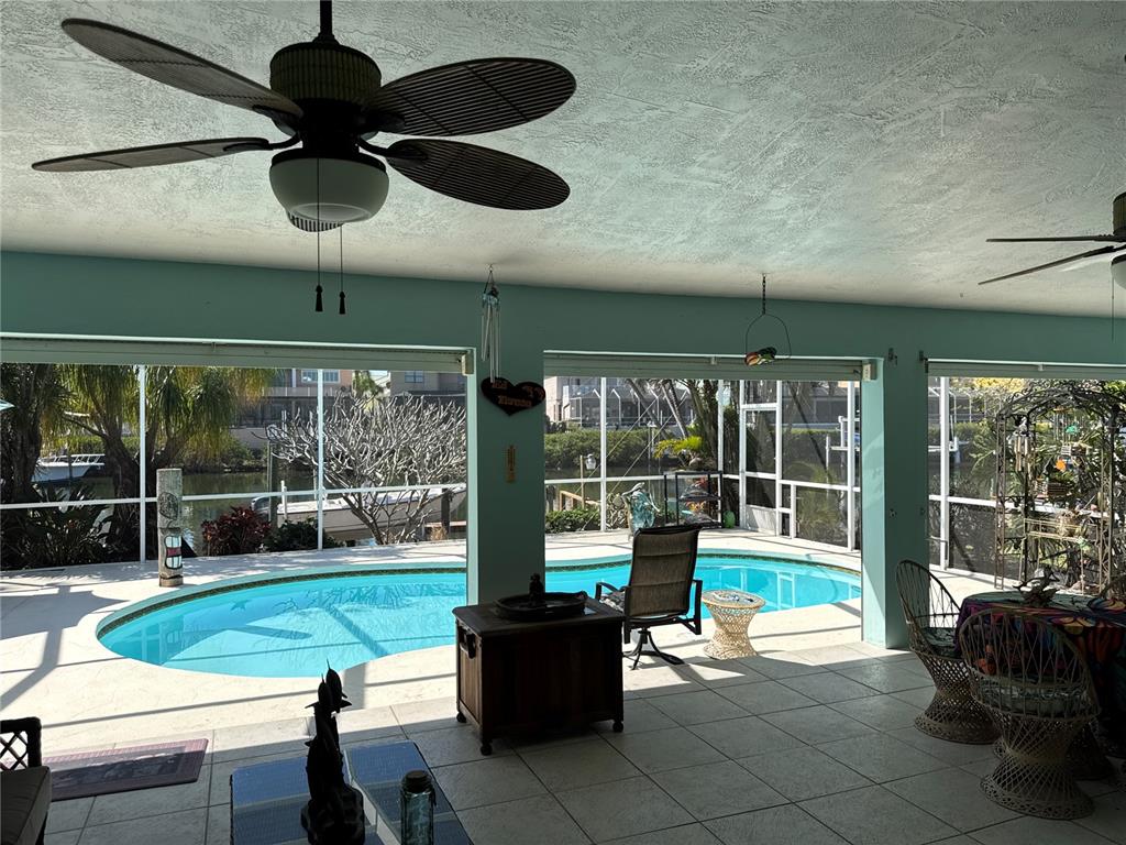6319 Cocoa Lane Apollo Beach, FL 33572 - Photo 7 of 37 a living room with furniture and a floor to ceiling window