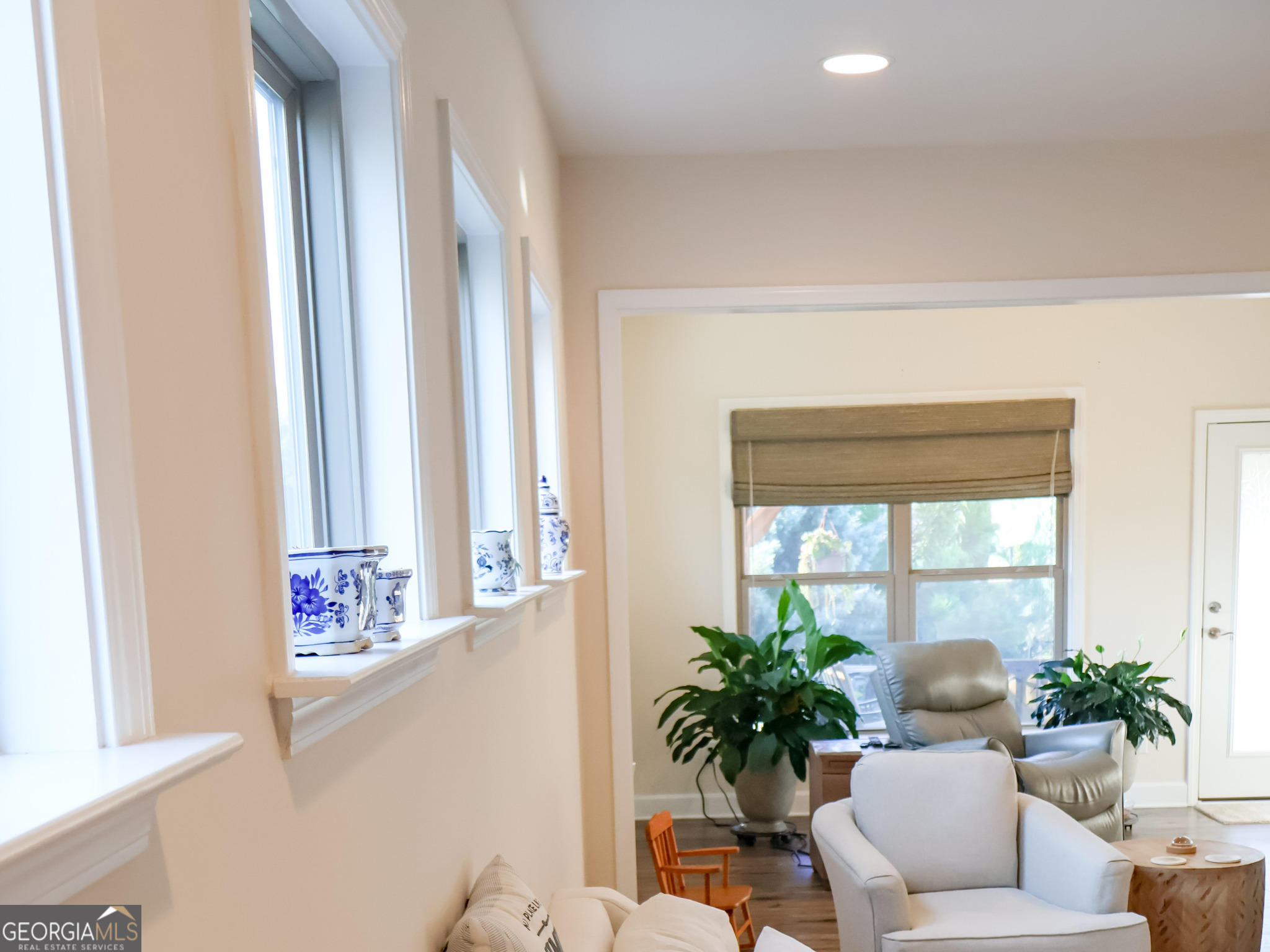 218 Florence Road Peachtree City, GA 30269 - Photo 17 of 47 a living room with furniture and a potted plant