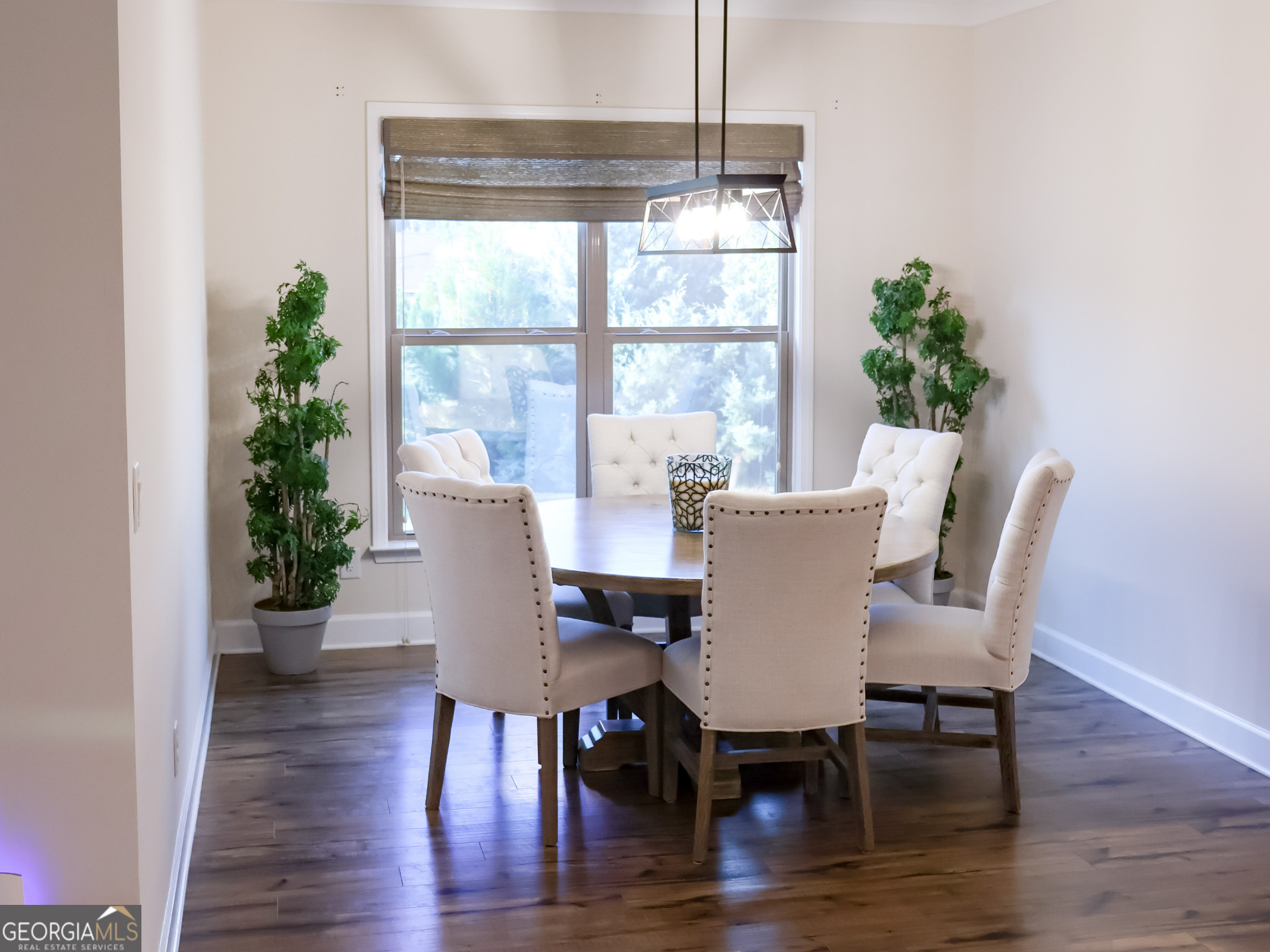 218 Florence Road Peachtree City, GA 30269 - Photo 19 of 47 a view of a dining room with furniture window and wooden floor