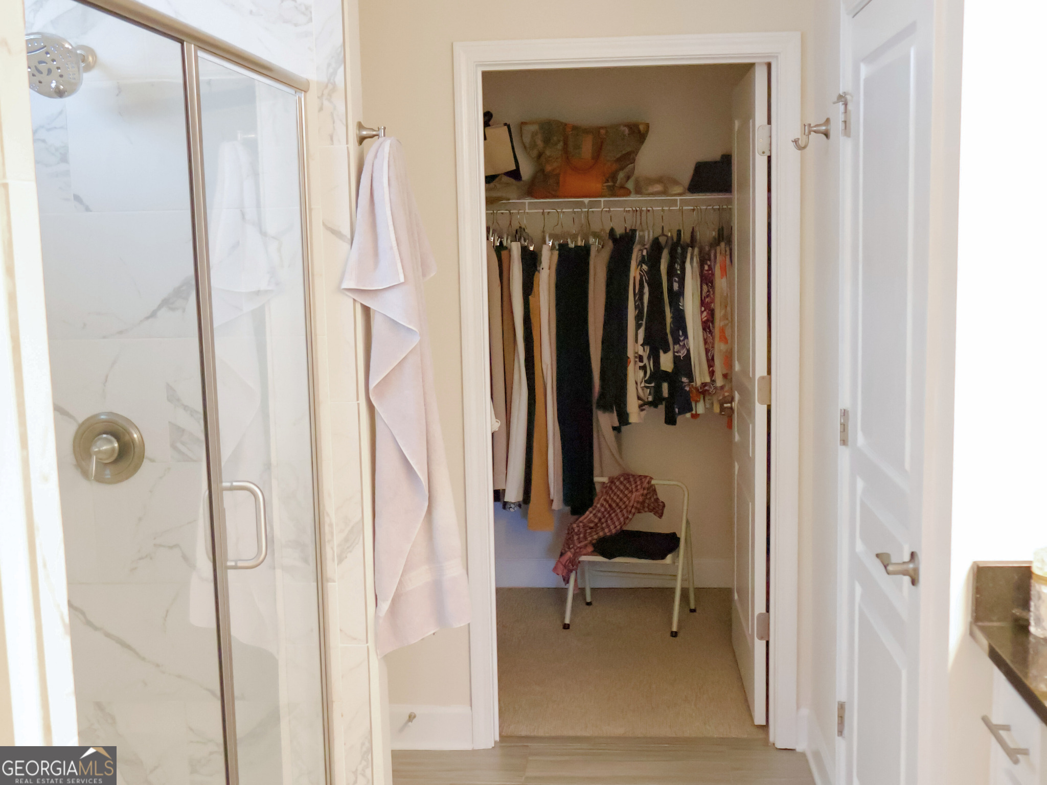 218 Florence Road Peachtree City, GA 30269 - Photo 29 of 47 a view of a walk in closet and bathroom