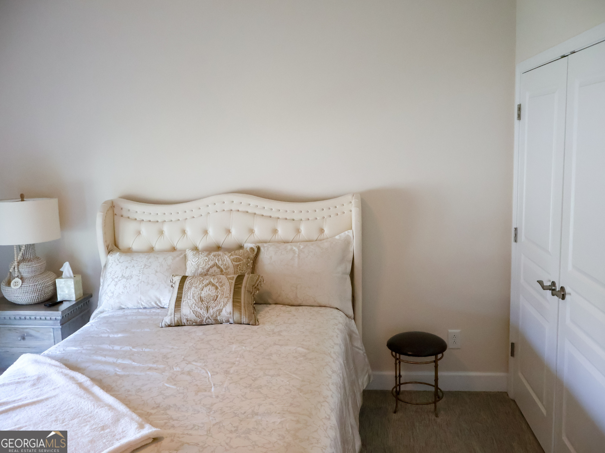 218 Florence Road Peachtree City, GA 30269 - Photo 31 of 47 a bedroom with a bed and a lamp