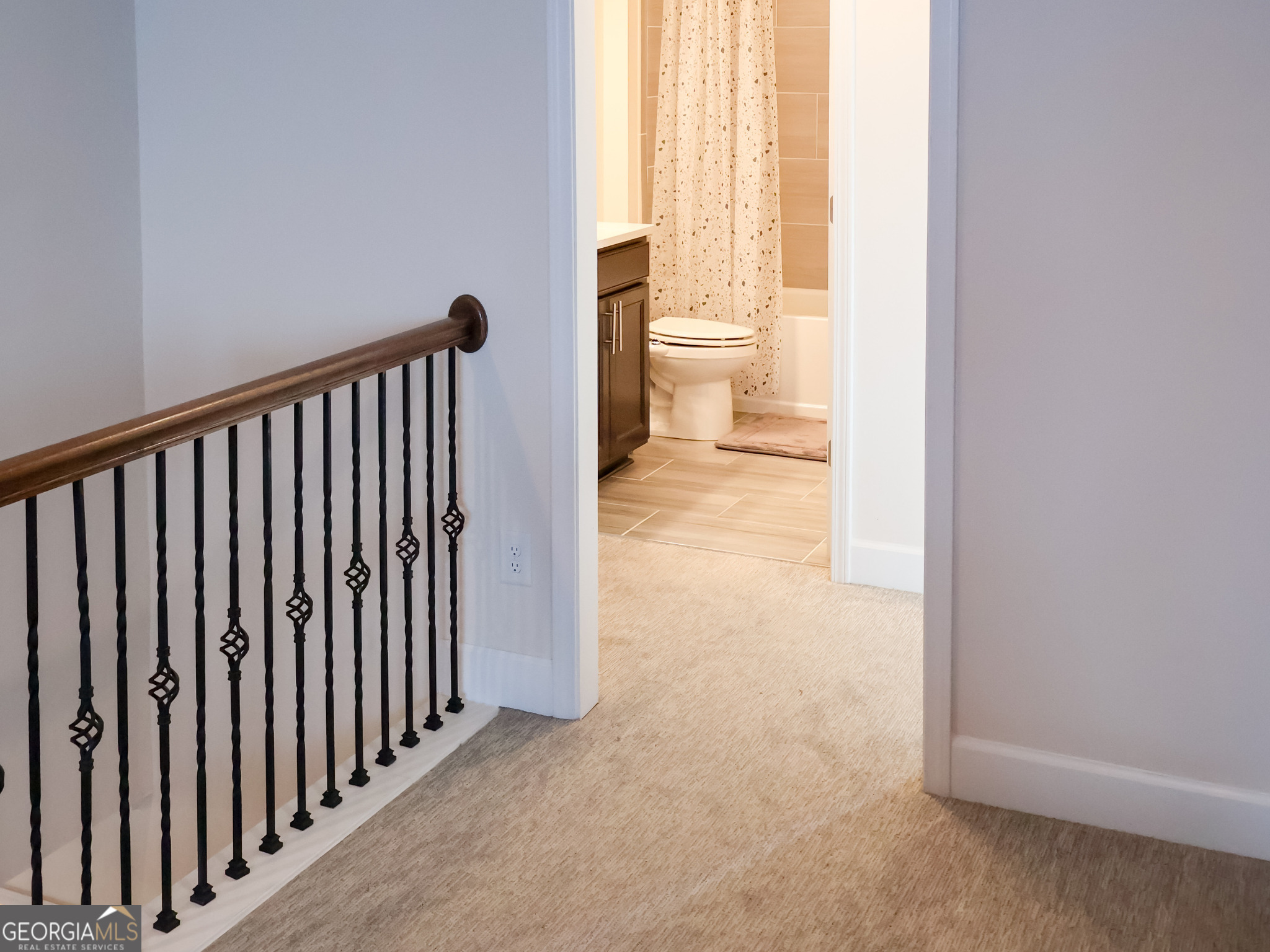 218 Florence Road Peachtree City, GA 30269 - Photo 36 of 47 a view of a hallway with wooden floor and a window