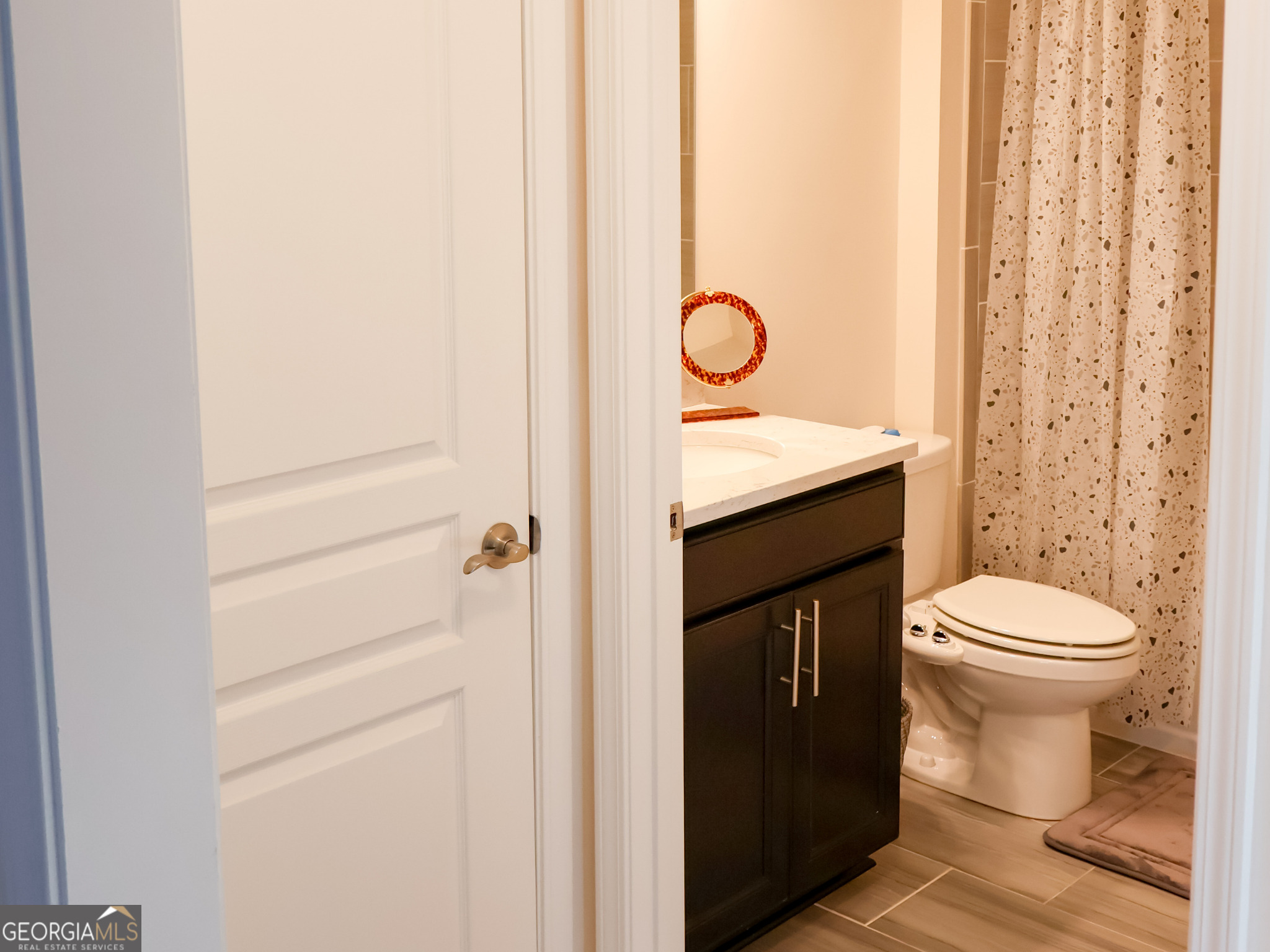 218 Florence Road Peachtree City, GA 30269 - Photo 37 of 47 a bathroom with a sink a toilet and shower