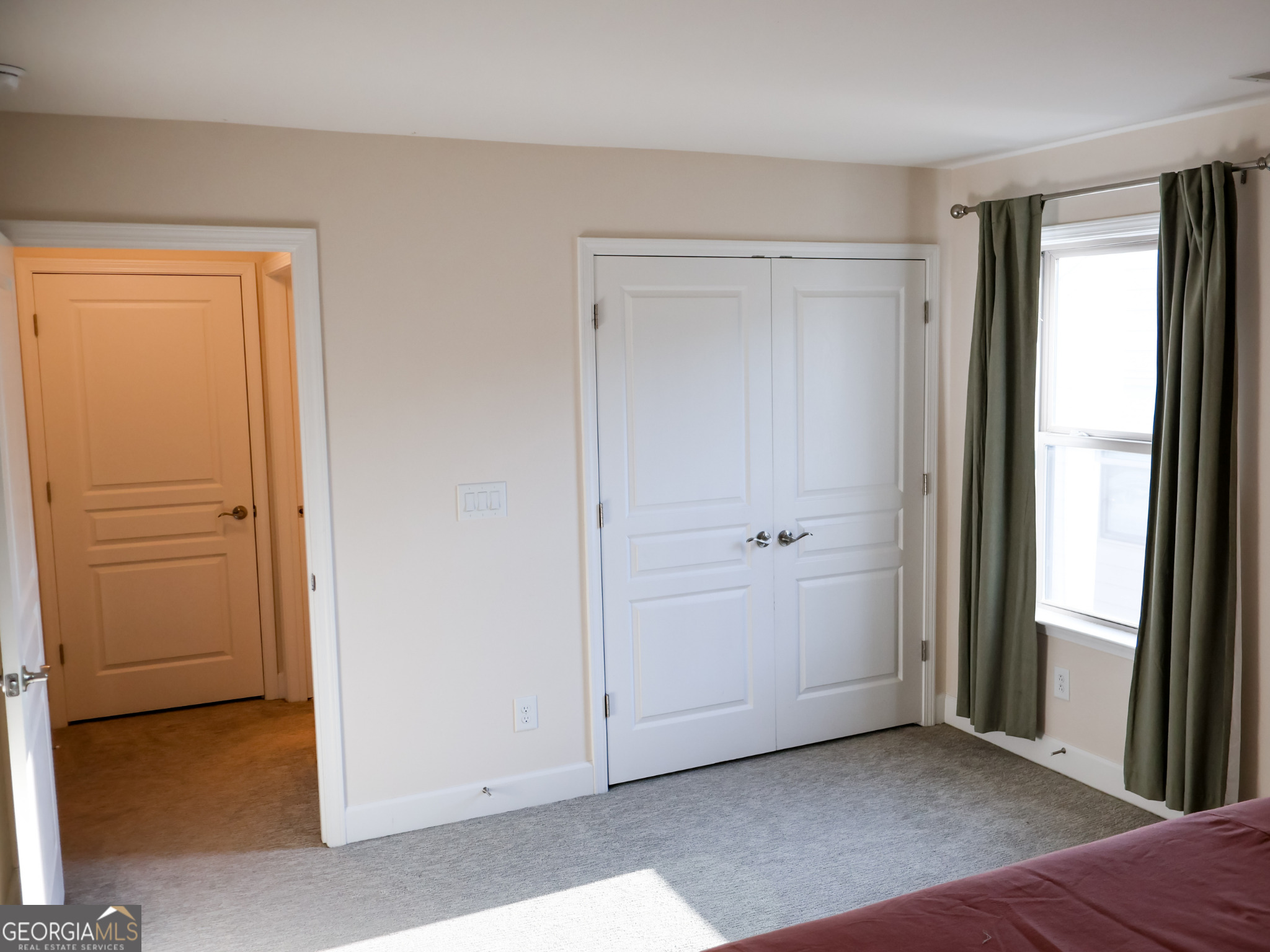 218 Florence Road Peachtree City, GA 30269 - Photo 40 of 47 a view of an empty room with window and closet area