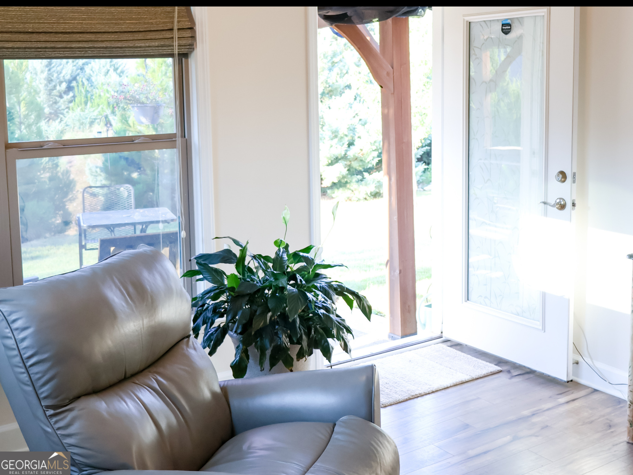 218 Florence Road Peachtree City, GA 30269 - Photo 41 of 47 a living room with furniture and a potted plant
