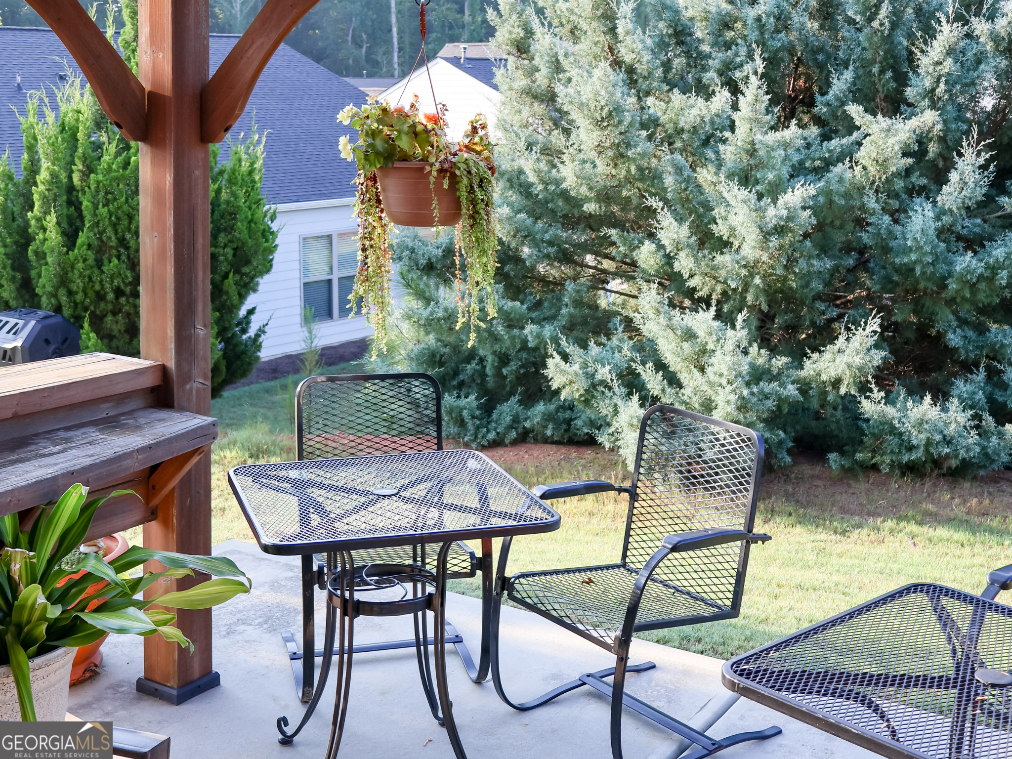 218 Florence Road Peachtree City, GA 30269 - Photo 46 of 47 a view of a chairs and table in the patio