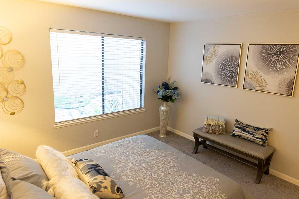 115 Rancho Drive, Unit B San Jose, CA 95111 - Photo 13 of 18 a bedroom with a bed and a window