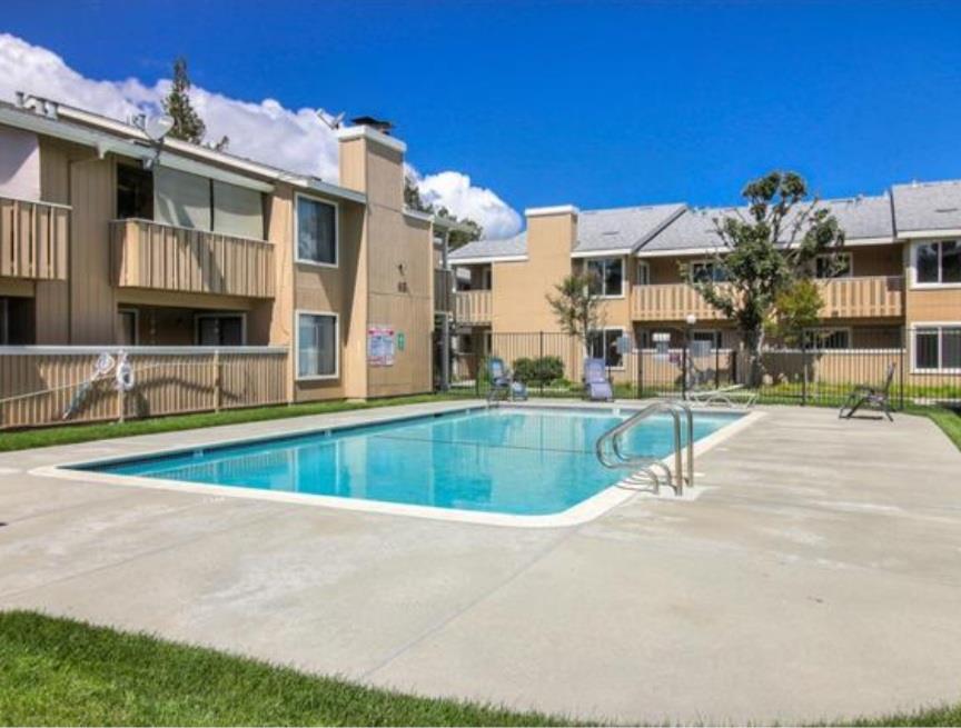 115 Rancho Drive, Unit B San Jose, CA 95111 - Photo 16 of 18 a view of a house with a swimming pool