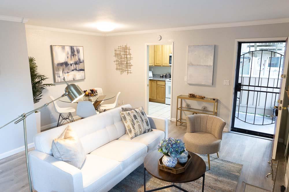 115 Rancho Drive, Unit B San Jose, CA 95111 - Photo 3 of 18 a living room with furniture fireplace and a window