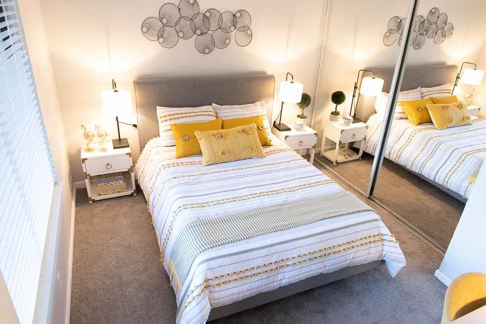 115 Rancho Drive, Unit B San Jose, CA 95111 - Photo 9 of 18 a bedroom with a bed and wooden floor