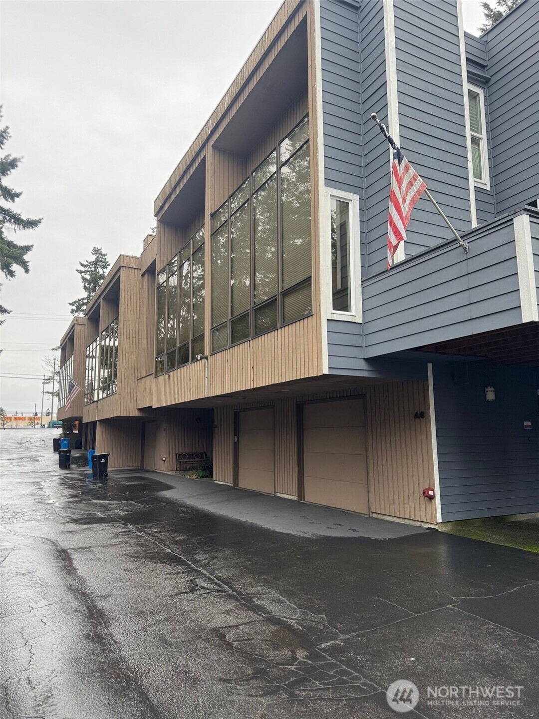 1409 North 200th Street, Unit A6 Shoreline, WA 98133 - Photo 2 of 2 a view of a house with a street