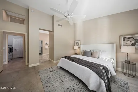 a kitchen with stainless steel appliances granite countertop a stove a sink a dining table and chairs