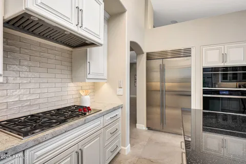 a picture of a bathroom with a shower