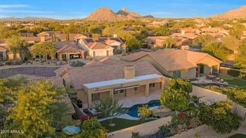an aerial view of a house with a garden