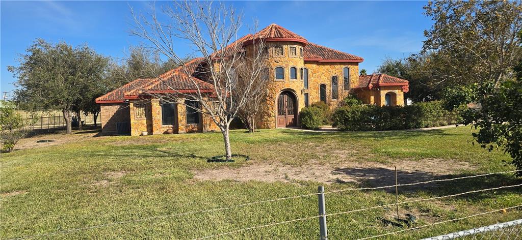 5312 Mile 4 Road Mission, TX 78573 - Photo 2 of 13 Mediterranean / spanish home with stone siding
