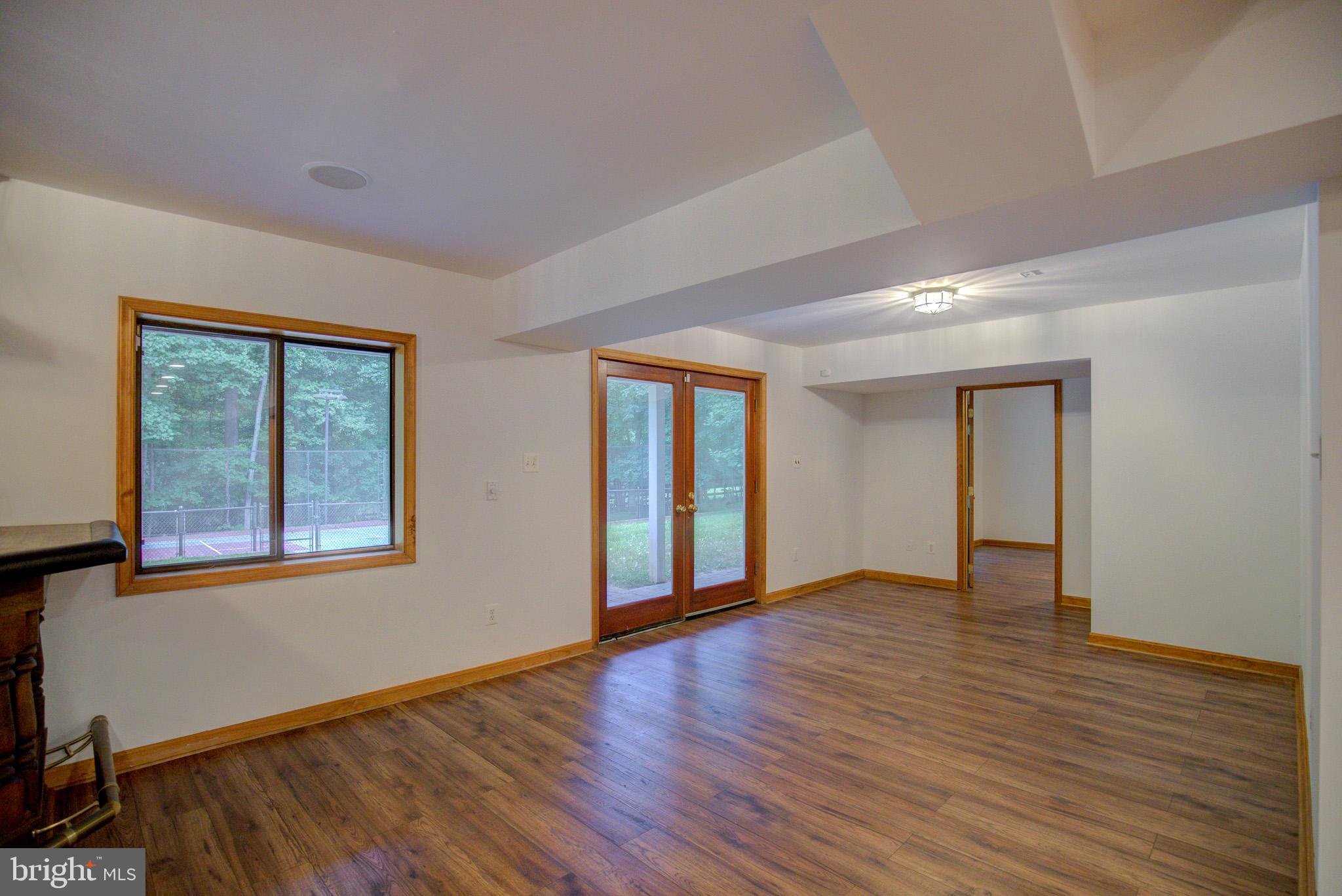 813 Blacks Hill Road Great Falls, VA 22066 - Photo 62 of 92 LL Walk Out w/ Access to Pool & Sports Court