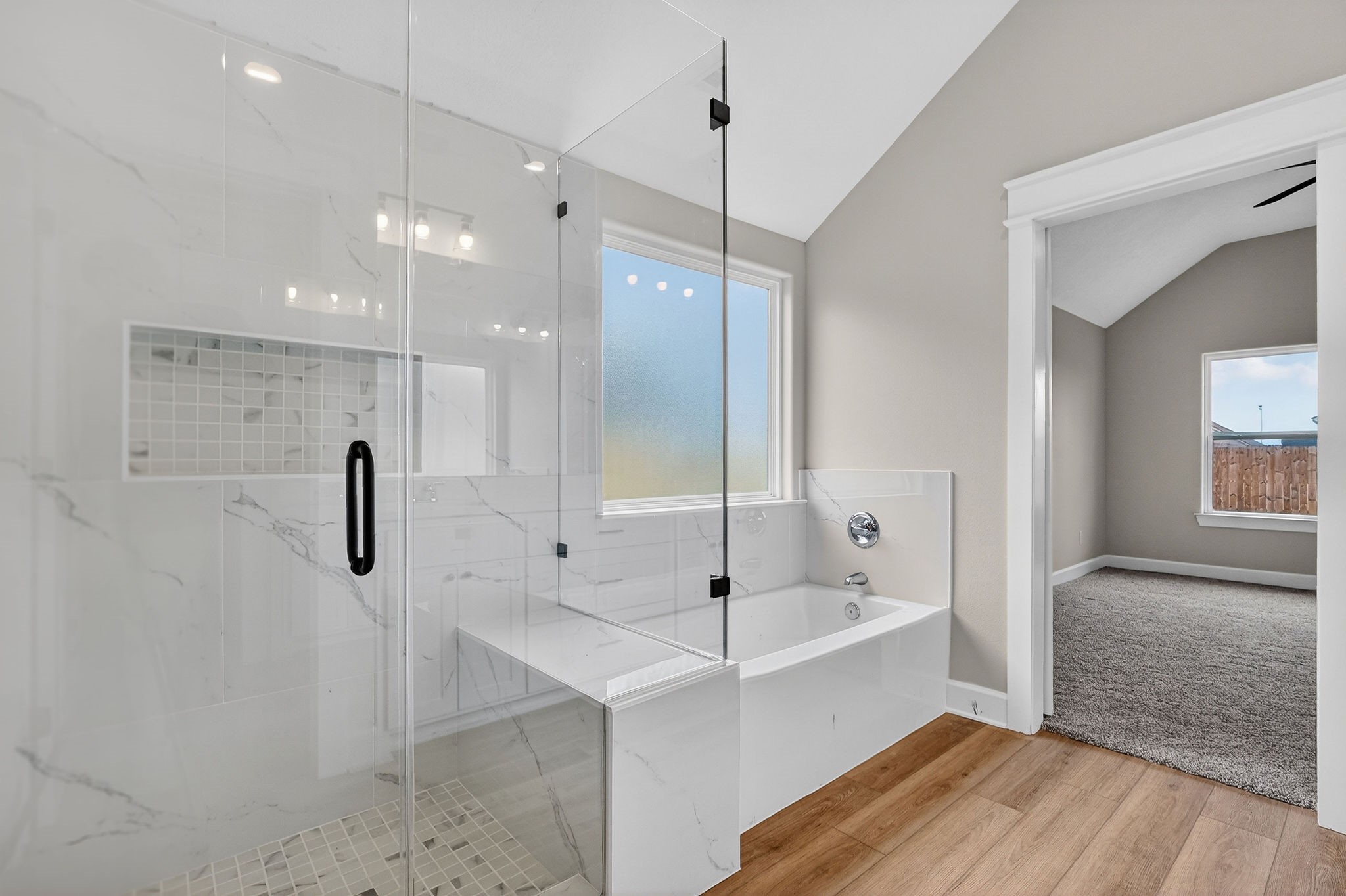 200 Orchard Cove Snook, TX 77879 - Photo 18 of 45 a bathroom with a bathtub and a sink