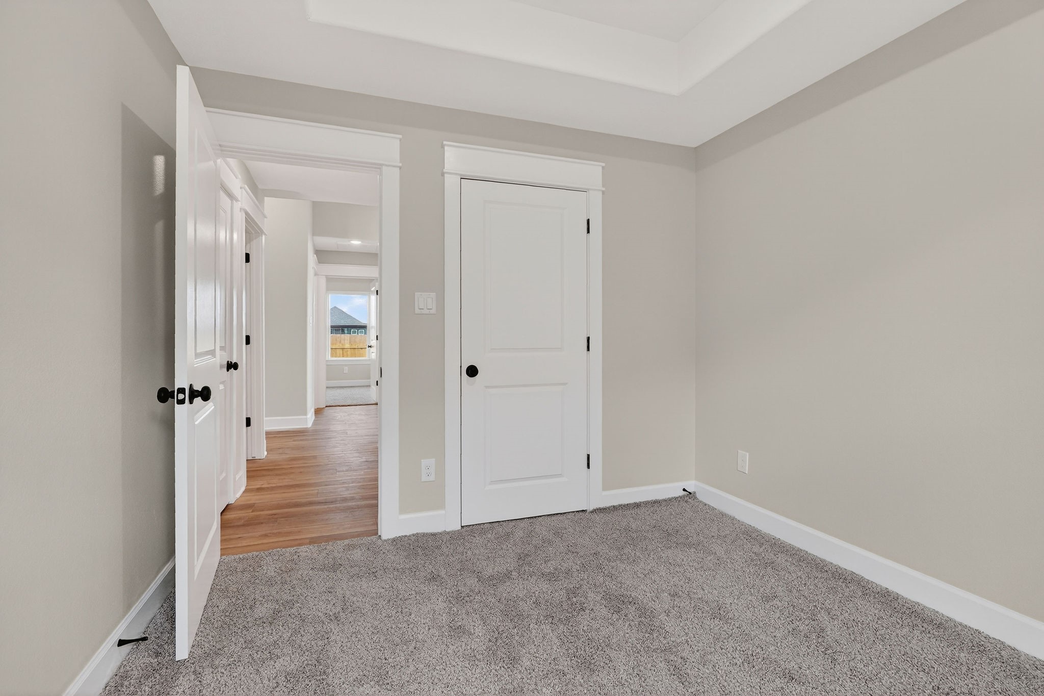 200 Orchard Cove Snook, TX 77879 - Photo 22 of 45 wooden floor in a hall with a cabinet