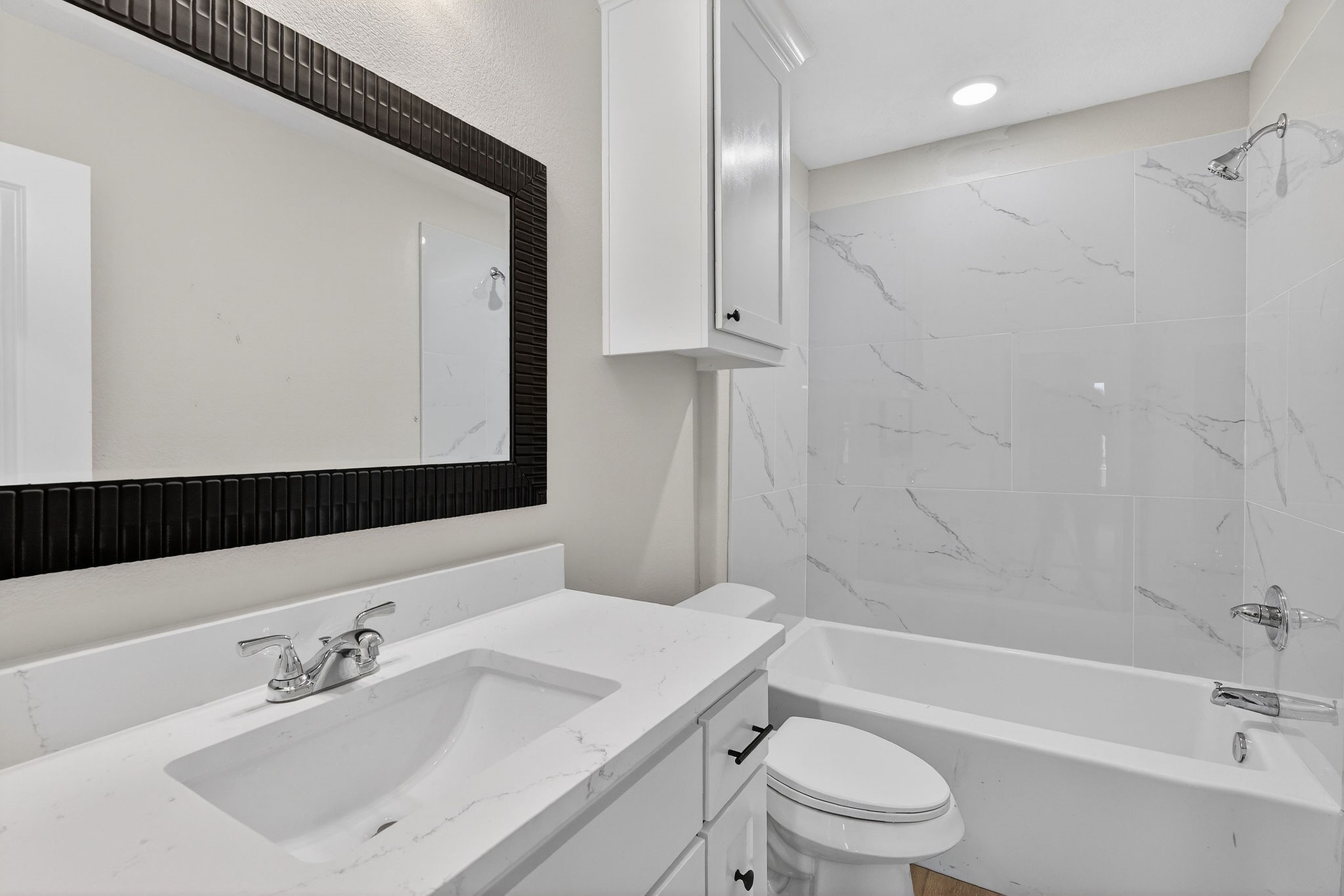 200 Orchard Cove Snook, TX 77879 - Photo 25 of 45 a bathroom with a sink a toilet and a mirror