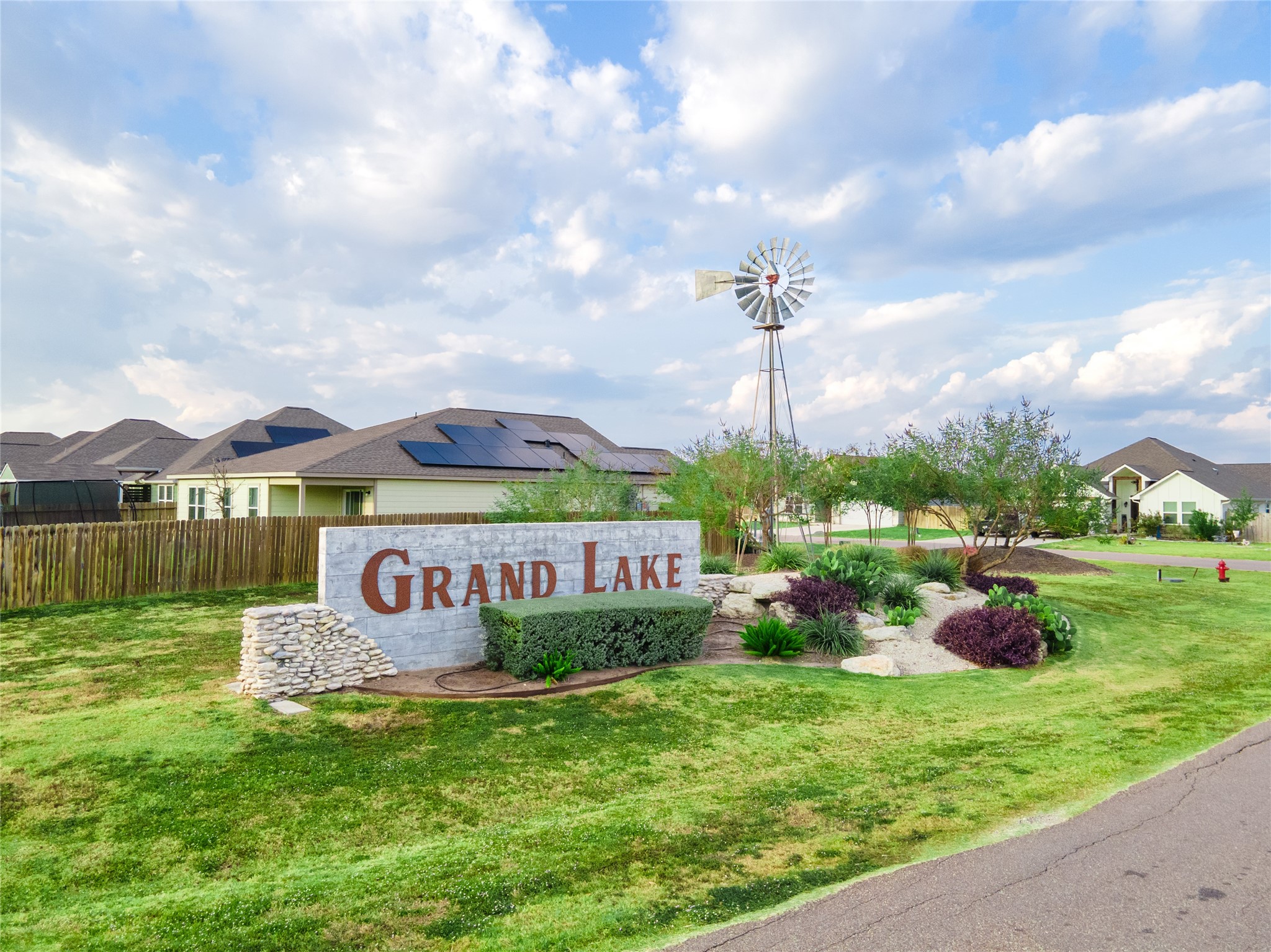 200 Orchard Cove Snook, TX 77879 - Photo 44 of 45 a sign board with the view of lake in the background