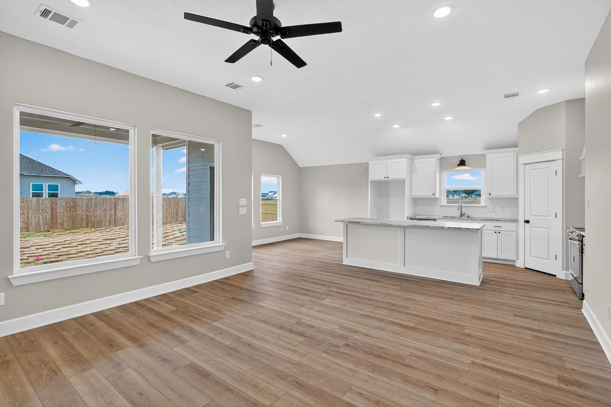 200 Orchard Cove Snook, TX 77879 - Photo 5 of 45 a view of kitchen with cabinets and wooden floor