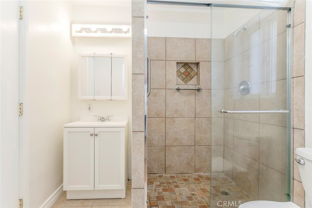 10347 Newhome Avenue Sunland, CA 91040 - Photo 13 of 33 a bathroom with a shower
